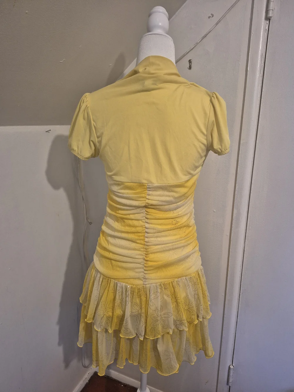 Amy's Closet Yellow Ruched Short Sleeve Tunic with Ruffle Hem and Brooch